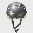 Video in Galerie-Betrachter laden und wiedergeben, Sleek Black Ebike Bicycle Helmet with an Adjustable Visor, Designed for Men and Women Seeking Style and Safety on E-Bike Rides
